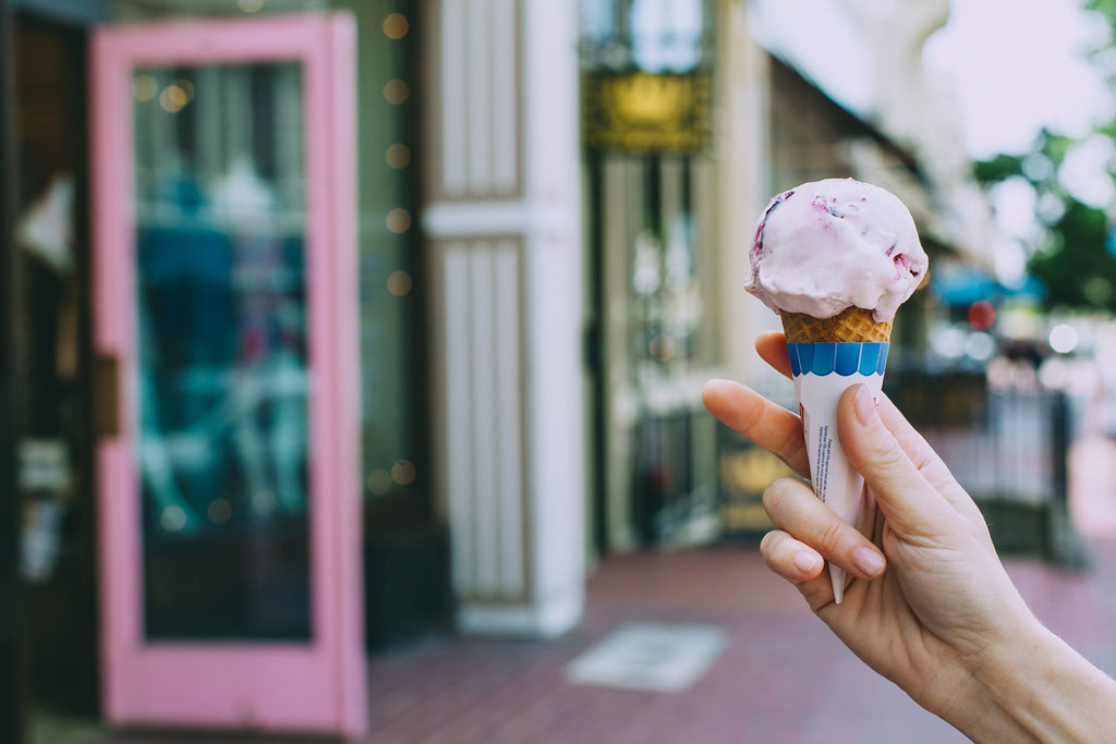 Person Holding Icecream On Street